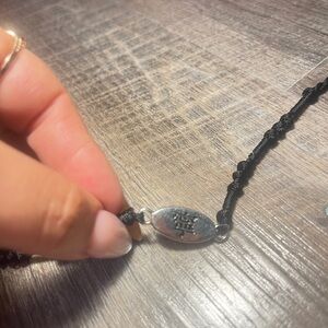 Black Braided Bracelet with Silver Charm